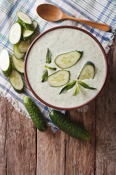 istock Cold cucumber soup with mint and yogurt close-up. vertical 636368218