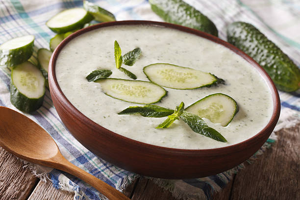 istock Soup of fresh cucumbers with mint and yogurt closeup 636368328