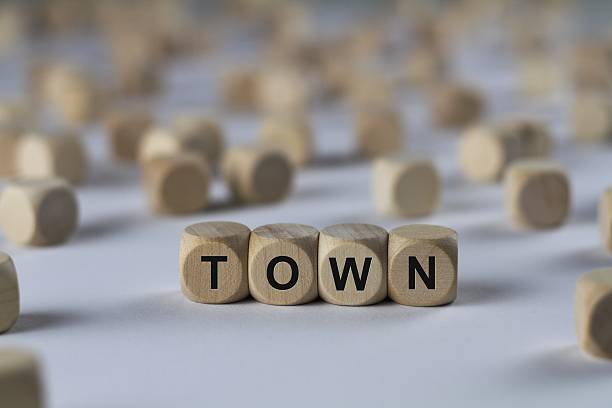 istock town - cube with letters, sign with wooden cubes 636370372