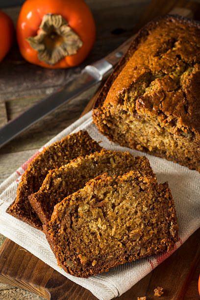 istock Homemade Sweet Persimmon and Nut Bread 636371874
