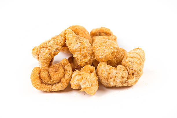 istock Pork rinds isolated on white background 636372934