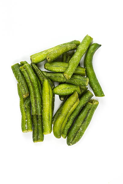 istock Dried green beans isolated on white background 636373024