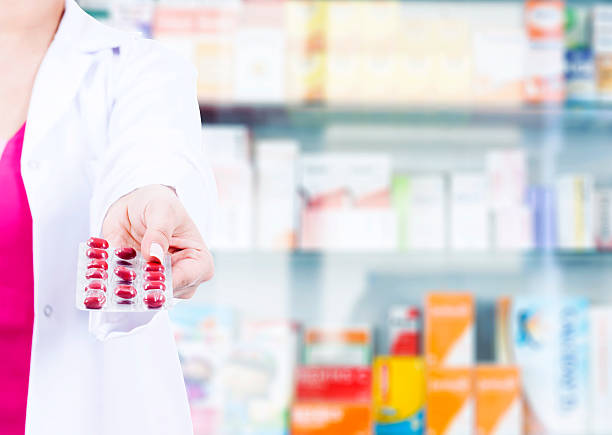 istock Female pharmacist at the drugstore 636377686