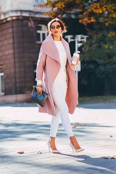 istock Beautiful elegant woman drinking coffee 636377736