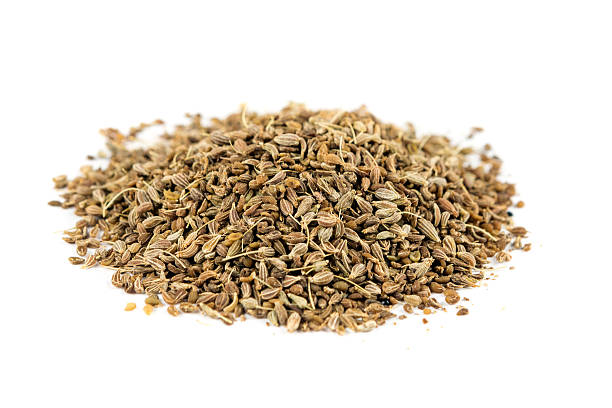 istock Whole anise seed isolated on white background 636377860