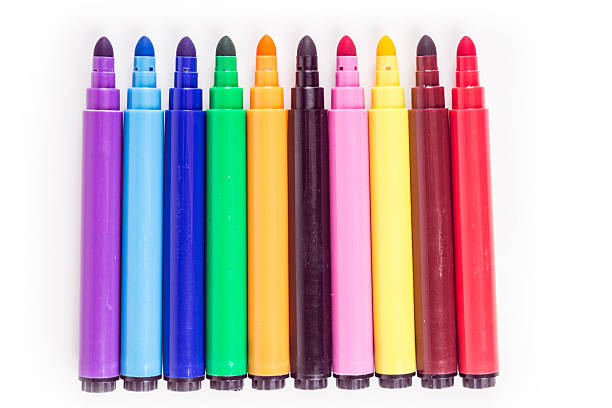 istock Rainbow colored pack of markers isolated on white background 636379618