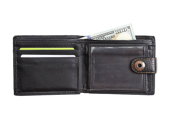 istock open  black  leather wallet with cash  dollars 636379794