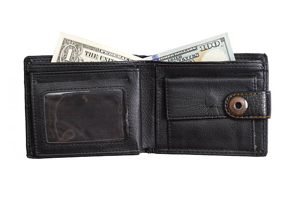 istock open  black  leather wallet with cash  dollars 636379942