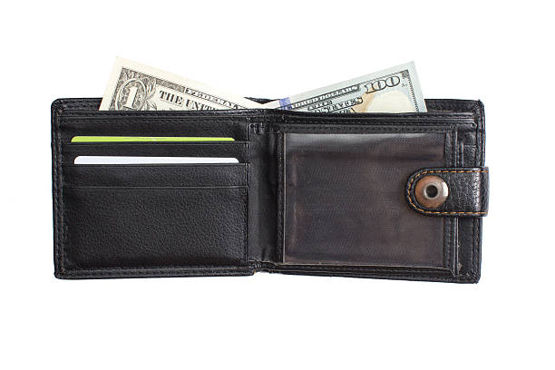 istock open  black  leather wallet with cash  dollars 636380066