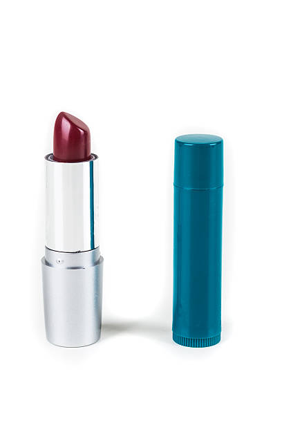 istock Lipstick and chapped lips moisturizer stick isolated on white background 636380170
