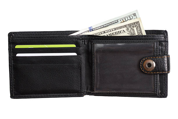 istock open  black  leather wallet with cash  dollars 636380176