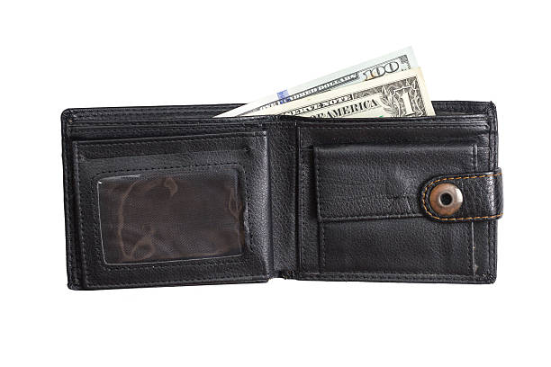 istock open  black  leather wallet with cash  dollars 636380296