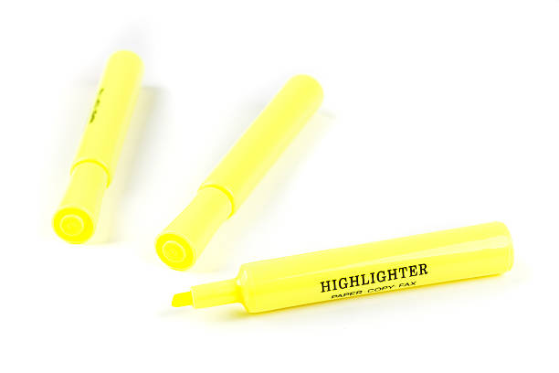 istock Three yellow highlighters isolated on white background 636380840