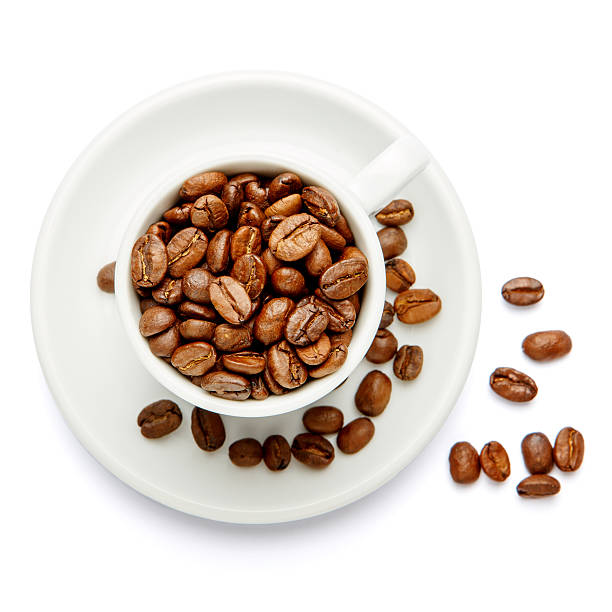 istock cup of coffee beans on white background 636383962