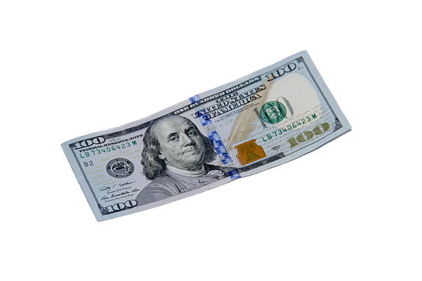 istock One hundred dollar bill isolated on white background 636384468