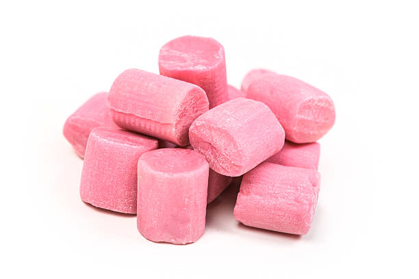 istock Pile of bubble gum pieces isolated on white background 636384600