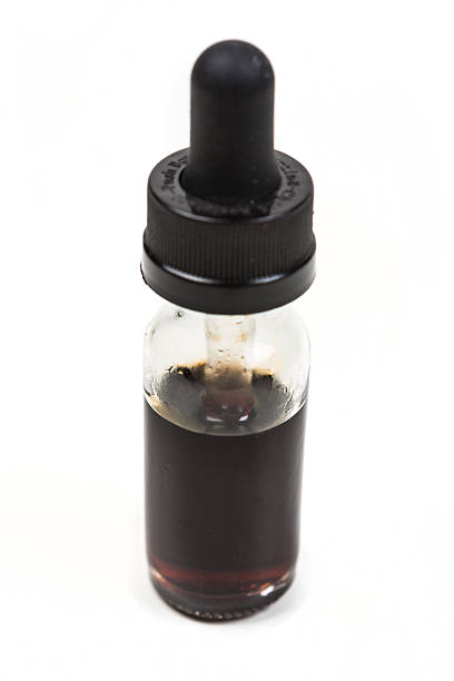 Expired discolored vape juice isolated on white background