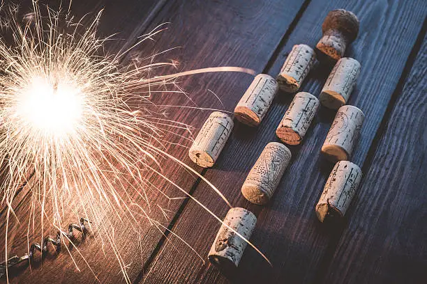 Photo of Wine corks in form of Christmas tree and sparklers
