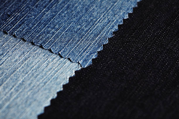 istock Blue and black Color Denim Jeans Fabric swatches background 636399094