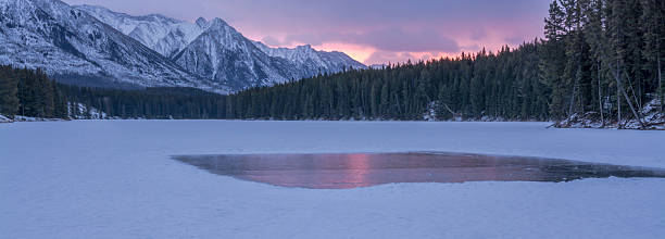 istock Skating Rink on a Mountain Lake at Sunrise 636399112