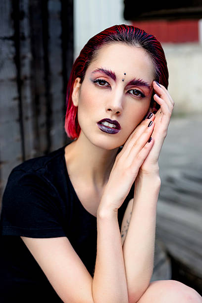 istock Attractive young woman with expressive eyes 636401012