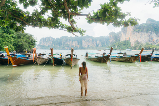 Young Caucasisan woman on the Railey beach in Thailand  