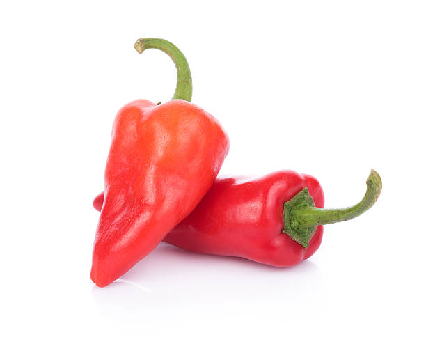 istock Red chili peppers on white background 636406784