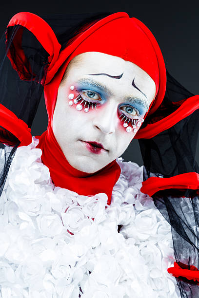 istock Close up portrait with cheerful clown 636407742