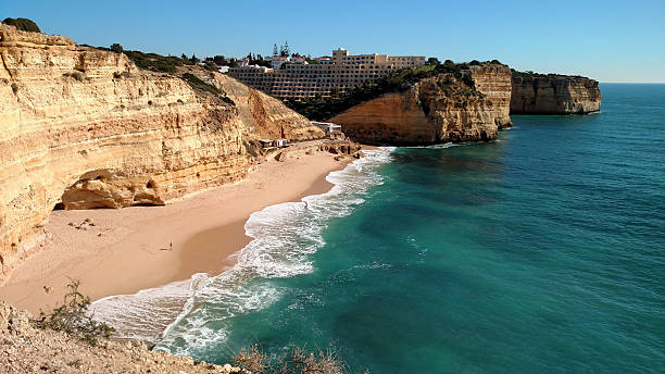 istock Sandy beach limestone cliffs Praia de Vale Centeanes Algarve Portugal 636409414