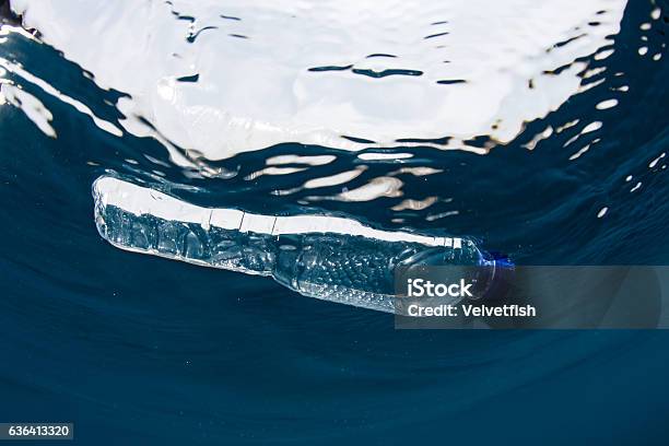 Plastic Bottle Floating In Ocean Stock Photo - Download Image Now - Plastic, Sea, Bottle