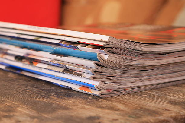 istock Magazines on the wooden table 636416156