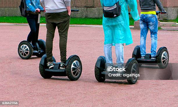 People Move On Segway Stock Photo - Download Image Now - Segway, Riding, Activity