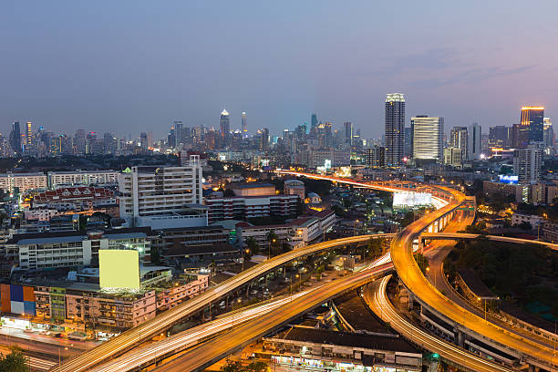 istock Bangkok Highway interchanged with city downtown 636423640