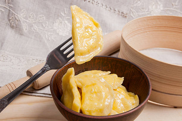 istock Close up view of boiled varenyky or dumpling with cheese 636424296