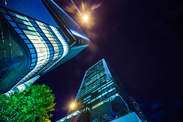 istock Office buildings at night in downtown Osaka 636430628