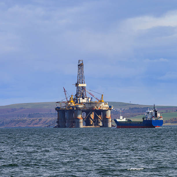 Semi Submersible Oil Rig at Cromarty Firth Semi Submersible Oil Rig at Cromarty Firth in Invergordon, Scotland ballast water stock pictures, royalty-free photos & images