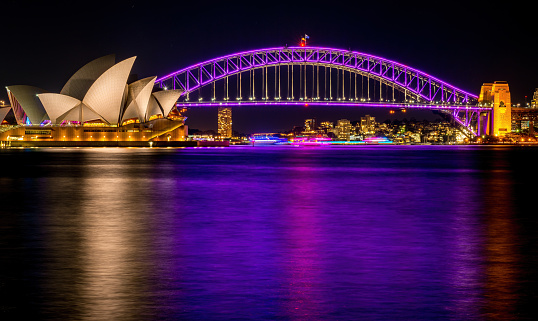 Sydney, Australia - May 29, 2016: Sydney Opera House and Harbour Bridge by night. Viewed from Mrs Macquarie's Chair, Sydney, New South Wales, Australia. High resolution long exposure image.
