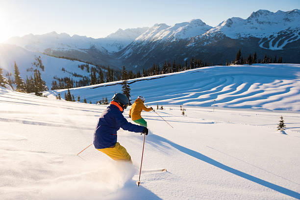 man skiing on steep black diamond trail