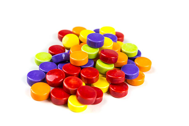 istock Pile of hard sour candy isolated on a white background 636447372
