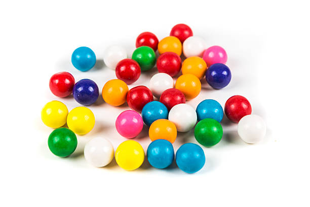 istock Multicolored gum balls isolated on a white background 636447426