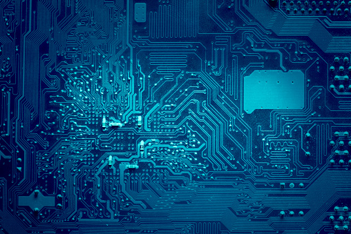 Circuito electrónico informático. Color azul, desteñido en los lados. photo