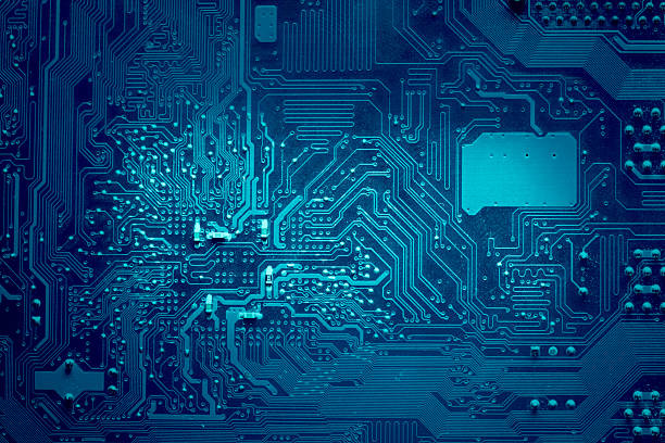circuit électronique informatique. couleur bleue, fanée sur les côtés. - circuit intégré photos et images de collection