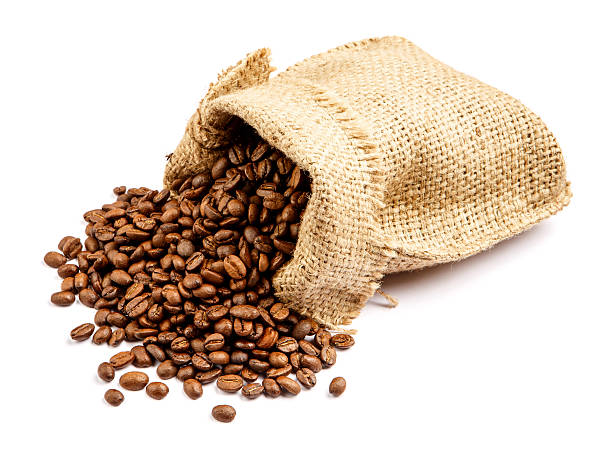 istock roasted coffee beans in bag isolated on white background 636449736