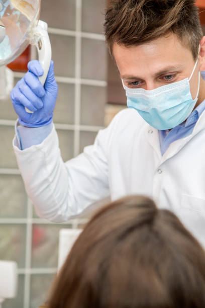 istock Woman in dental office 636450208