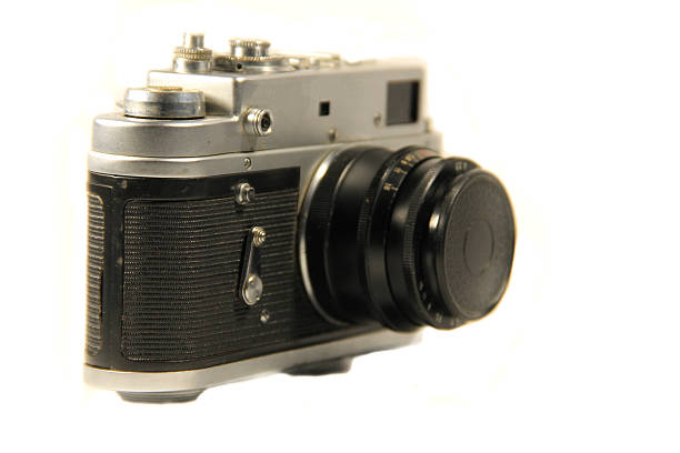 istock Retro photo camera isolated on white background 636454222
