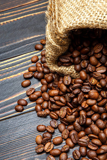 istock roasted coffee beans on wooden background 636455008