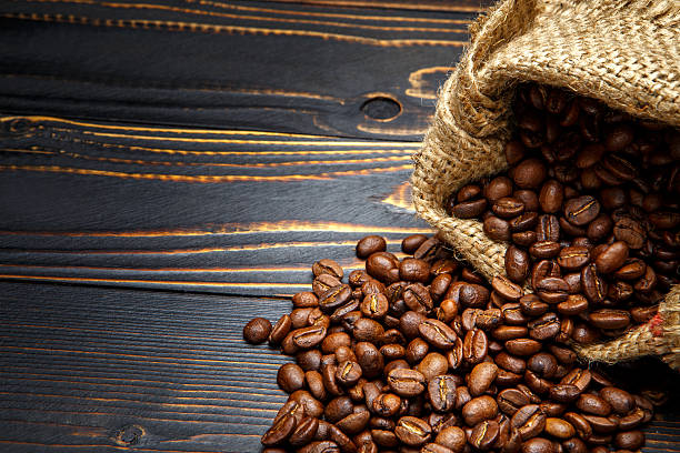 istock roasted coffee beans on wooden background 636455458