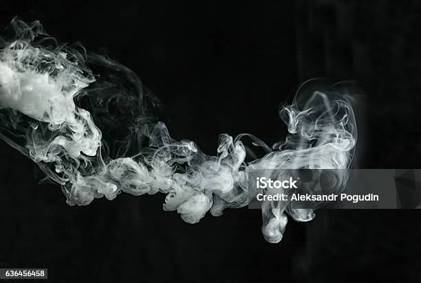 Vapor Like Smoke On A Dark Background Stock Photo - Download Image Now - Smoke - Physical Structure, Smoking - Activity, Black Background