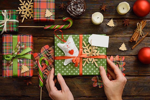 istock Give present box, decoration of gift on wooden table 636461244