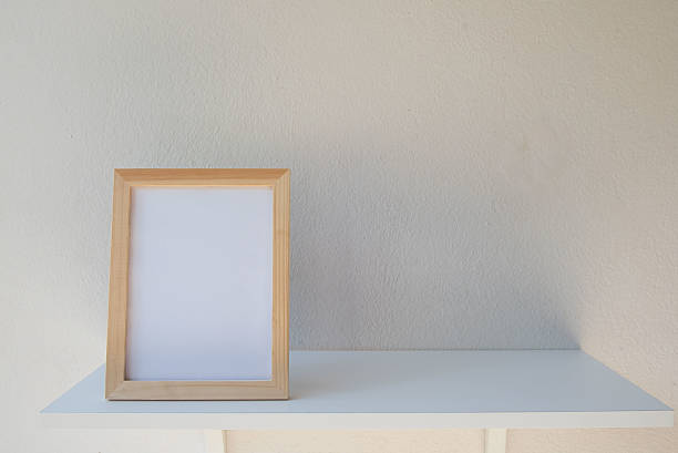 istock photo Frame on a wooden on White background 636462242